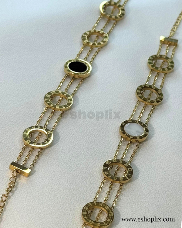 Elegant Gold Bracelet with Roman Numeral Charms.